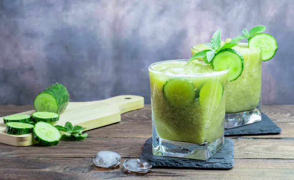 cucumber and mint cooler in glass with ice