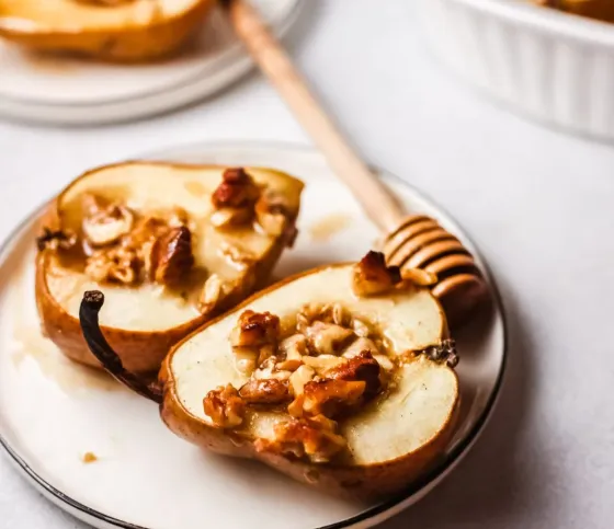 baked pears with nuts and honey on top